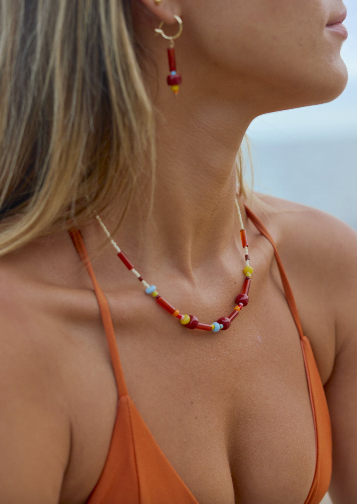yellow and red beaded necklaces